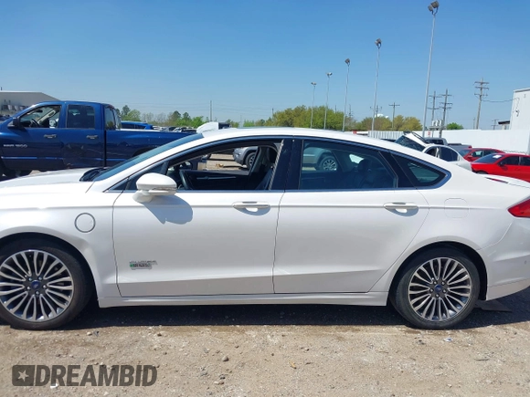 2017 Ford Fusion Titanium with VIN 3FA6P0SUXHR147336, listed as a IAAI auction lot 41873106 with 103,247 mi miles and . Bid and sale history available at DreamBid. Image 14.