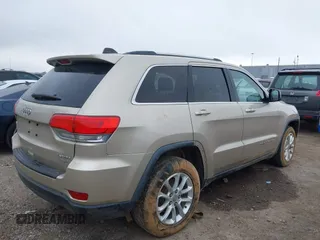 2014 Jeep Grand Cherokee Laredo with VIN 1C4RJEAG5EC424244, listed as a IAAI auction lot 41608821 with 156,251 mi miles and . Bid and sale history available at DreamBid. Image 4.