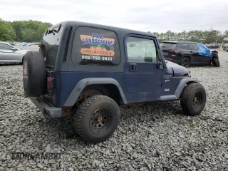 2001 Jeep Wrangler Sport with VIN 1J4FA49S01P363856, listed as a Copart auction lot 62494785 with 154,782 mi miles and Salvage title. Bid and sale history available at DreamBid. Image 3.