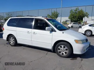 2004 Honda Odyssey EX-L with VIN 5FNRL18044B026360, listed as a IAAI auction lot 42454814 with Not provided miles and . Bid and sale history available at DreamBid. Image 1.