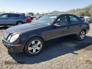 2005 Mercedes-Benz E 320 with VIN WDBUF65J55A675993, listed as a Copart auction lot 52446015 with 64,459 mi miles and Salvage Title. Bid and sale history available at DreamBid. Image 1.
