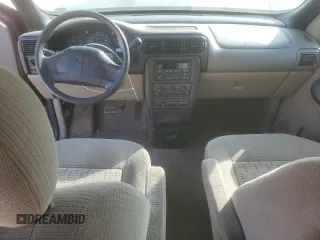 2004 Chevrolet Venture LS z VIN 1GNDX03E34D232151, wystawiony jako Copart lot #77205384 z przebiegiem 151 035 mil mil oraz Szkoda całkowita • Salvage title. Historia ofert i sprzedaży dostępna na DreamBid. Obrazek 8.
