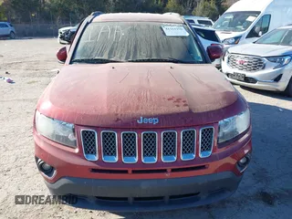 2016 Jeep Compass Latitude with VIN 1C4NJDEB1GD662807, listed as a IAAI auction lot 41161996 with 128,030 mi miles. Bid and sale history available at carsss.com. Image 11.