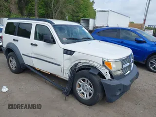 2007 Dodge Nitro SXT z VIN 1D8GU28K87W652037, wystawiony jako IAAI lot #42172950 z przebiegiem 172 487 mil mil oraz . Historia ofert i sprzedaży dostępna na DreamBid. Obrazek 1.