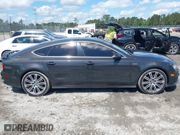 2013 Audi A7 Prestige with VIN WAU2GAFC8DN121215, listed as a IAAI auction lot 42246162 with 123,283 mi miles and . Bid and sale history available at DreamBid. Image 13.