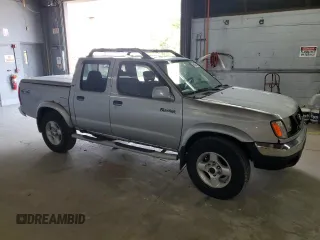 2000 Nissan Frontier XE z VIN 1N6ED27Y0YC391322, wystawiony jako Copart lot #60598405 z przebiegiem Nie podano mil oraz Czysty tytuł • Clean title. Historia ofert i sprzedaży dostępna na DreamBid. Obrazek 4.