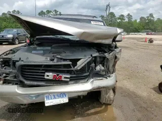 2002 GMC Yukon SLT z VIN 1GKEC13Z22R158811, wystawiony jako Copart lot #74568464 z przebiegiem Nie podano mil oraz Szkoda całkowita • Salvage title. Historia ofert i sprzedaży dostępna na DreamBid. Obrazek 11.