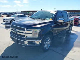 2018 Ford F-150 XL with VIN 1FTEW1E53JFE67555, listed as a IAAI auction lot 41653137 with 122,886 mi miles. Bid and sale history available at carsss.com. Image 2.