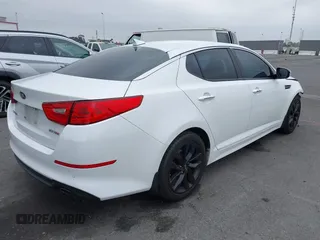 2015 Kia Optima SX with VIN 5XXGR4A72FG513250, listed as a IAAI auction lot 42418208 with 89,969 mi miles and . Bid and sale history available at DreamBid. Image 4.