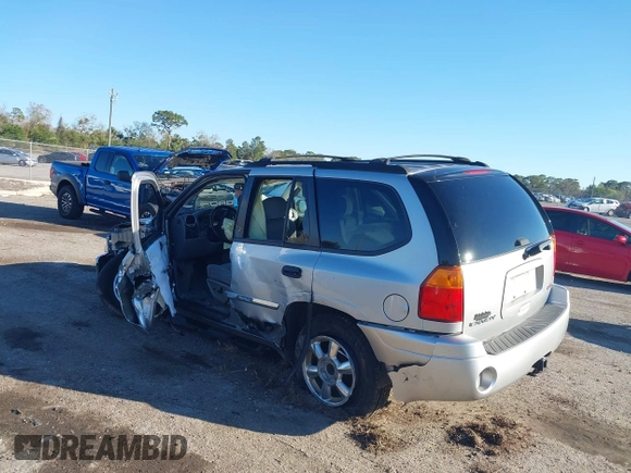 2008 GMC Envoy SLE2 with VIN 1GKDS13S082141895, listed as a IAAI auction lot 41596735 with 174,914 mi miles. Bid and sale history available at carsss.com. Image 3.