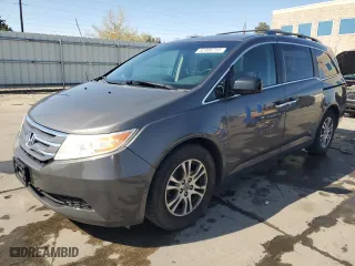 2013 Honda Odyssey EX-L with VIN 5FNRL5H6XDB017433, listed as a Copart auction lot 52306755 with 144,036 mi miles and Clean Title. Bid and sale history available at carsss.com. Image 1.
