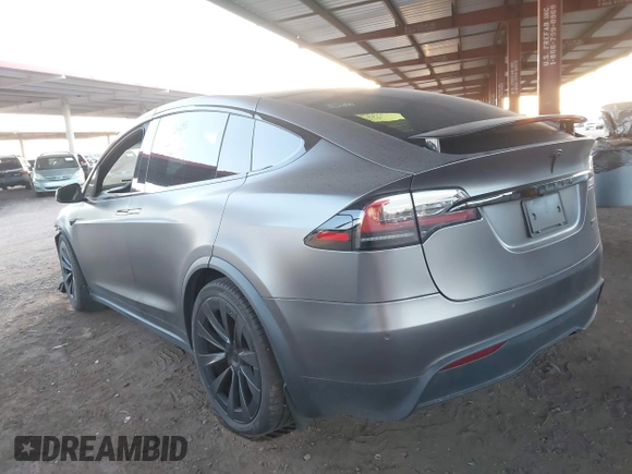 2022 Tesla Model X Plaid z VIN 7SAXCBE69NF352875, wystawiony jako IAAI lot #41964970 z przebiegiem 34 065 mil mil oraz . Historia ofert i sprzedaży dostępna na DreamBid. Obrazek 21.