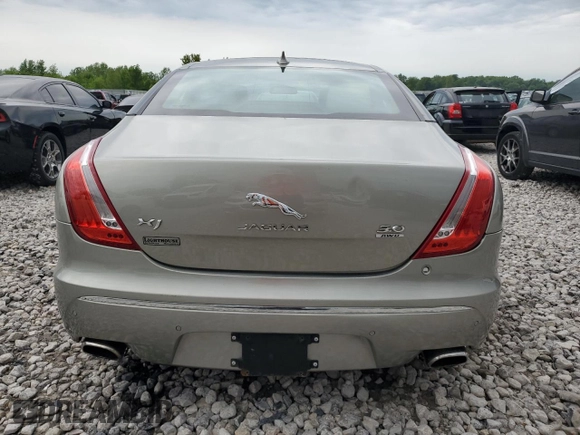2014 Jaguar XJ z VIN SAJWJ1CD9E8V62338, wystawiony jako Copart lot #58924065 z przebiegiem 60 909 mil mil oraz Czysty tytuł • Clean title. Historia ofert i sprzedaży dostępna na DreamBid. Obrazek 6.