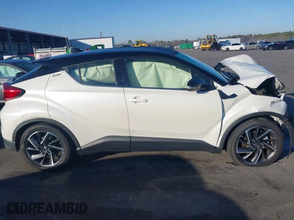 2021 Toyota C-HR LE with VIN JTNKHMBXXM1105546, listed as a IAAI auction lot 41486068 with 87,099 mi miles. Bid and sale history available at carsss.com. Image 13.