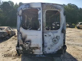 2015 Ford Transit with VIN 1FTNE1CM9FKB05709, listed as a Copart auction lot 59449354 with Not Provided miles and Salvage Title. Bid and sale history available at DreamBid. Image 6.