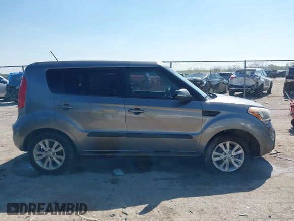 2012 Kia Soul + with VIN KNDJT2A69C7386679, listed as a IAAI auction lot 41969598 with 319,595 mi miles. Bid and sale history available at carsss.com. Image 13.
