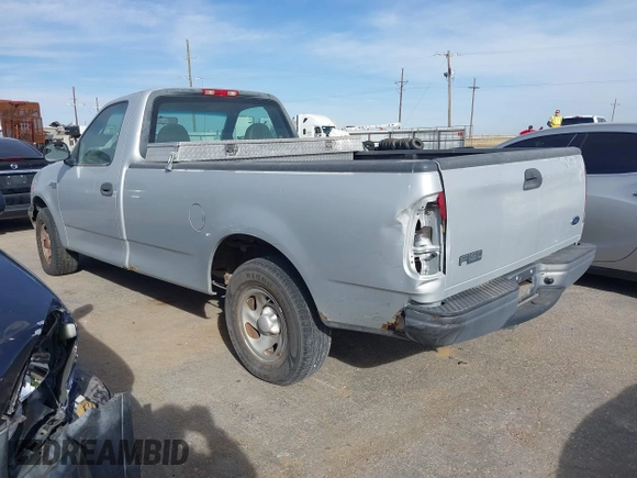 2002 Ford F-150 XL with VIN 3FTRF17212MA13777, listed as a IAAI auction lot 40977321 with 1 mi miles. Bid and sale history available at carsss.com. Image 3.
