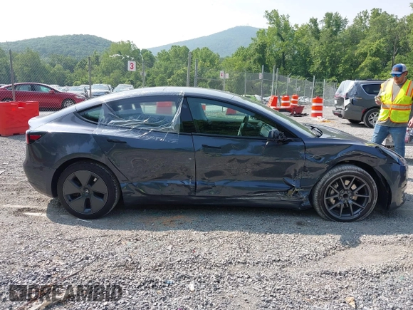 2023 Tesla Model 3 with VIN 5YJ3E1EA2PF566047, listed as a IAAI auction lot 42481008 with 21,143 mi miles and . Bid and sale history available at DreamBid. Image 13.