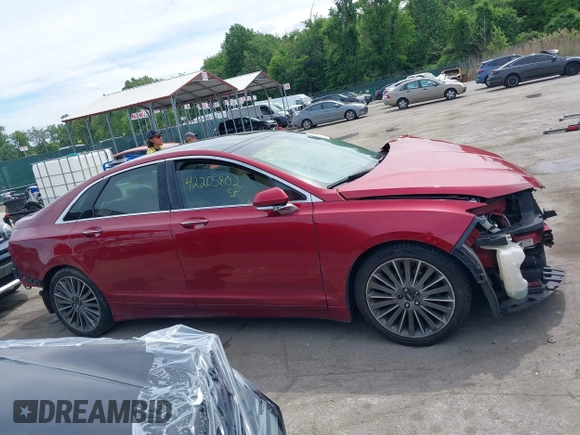 2014 Lincoln MKZ z VIN 3LN6L2G93ER802398, wystawiony jako IAAI lot #42205802 z przebiegiem 187 511 mil mil oraz . Historia ofert i sprzedaży dostępna na DreamBid. Obrazek 13.