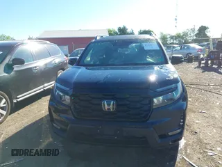 2022 Honda Passport Elite z VIN 5FNYF8H01NB003681, wystawiony jako IAAI lot #42186806 z przebiegiem 50 517 mil mil oraz . Historia ofert i sprzedaży dostępna na DreamBid. Obrazek 12.