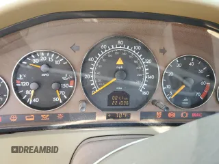 1999 Mercedes-Benz SL-Class with VIN WDBFA68F9XF175145, listed as a Copart auction lot 42160385 with 221,036 mi miles and Salvage Title. Bid and sale history available at carsss.com. Image 9.