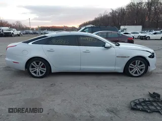 2017 Jaguar XJ with VIN SAJWJ2GD5H8W08395, listed as a IAAI auction lot 41014883 with 80,584 mi miles. Bid and sale history available at carsss.com. Image 13.