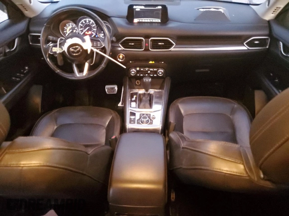 2018 Mazda CX-5 Grand Touring with VIN JM3KFBDM9J1326933, listed as a Copart auction lot 82180164 with 99,574 mi miles and Salvage title. Bid and sale history available at DreamBid. Image 8.