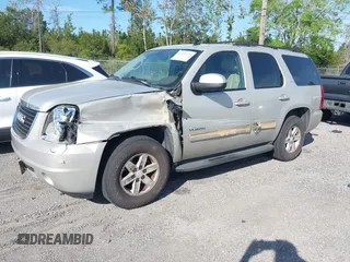 2010 GMC Yukon SLT with VIN 1GKMCCE3XAR225380, listed as a IAAI auction lot 41904723 with 173,686 mi miles. Bid and sale history available at carsss.com. Image 2.
