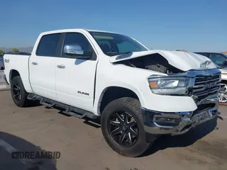 2021 Ram 1500 Laramie with VIN 1C6SRFJT7MN719238, listed as a IAAI auction lot 42482214 with 47,265 mi miles and . Bid and sale history available at DreamBid. Image 1.