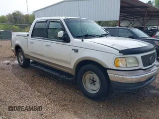 2001 Ford F-150 XLT with VIN 1FTRW07641KC51870, listed as a IAAI auction lot 41879102 with 202,967 mi miles and . Bid and sale history available at DreamBid. Image 1.