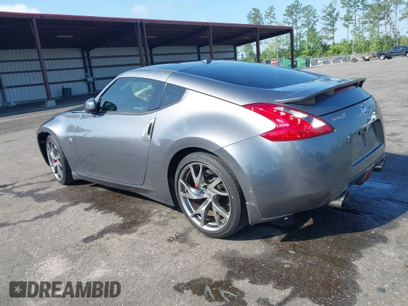 2013 Nissan 370Z with VIN JN1AZ4EH1DM880983, listed as a IAAI auction lot 41937876 with 130,613 mi miles. Bid and sale history available at carsss.com. Image 3.