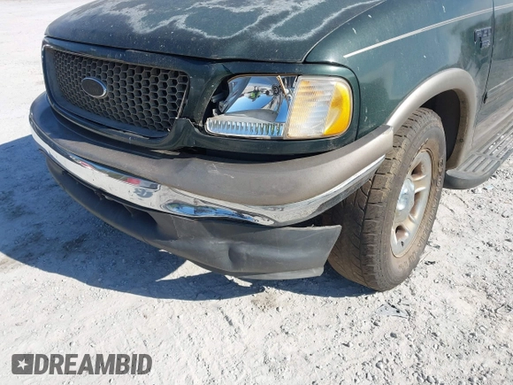 2003 Ford F-150 XLT with VIN 1FTRW07L53KA64064, listed as a IAAI auction lot 41697350 with 227,114 mi miles. Bid and sale history available at carsss.com. Image 6.