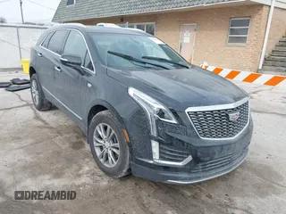 2021 Cadillac XT5 AWD Premium Luxury with VIN 1GYKNDRS7MZ168493, listed as a IAAI auction lot 41395162 with 33,064 mi miles. Bid and sale history available at carsss.com. Image 1.
