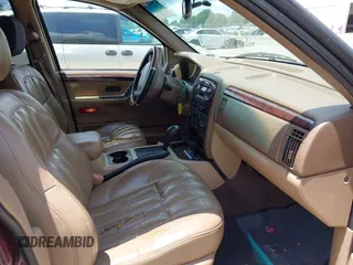 2000 Jeep Grand Cherokee Laredo with VIN 1J4G258S4YC381030, listed as a IAAI auction lot 42541918 with 306,934 mi miles and . Bid and sale history available at DreamBid. Image 5.