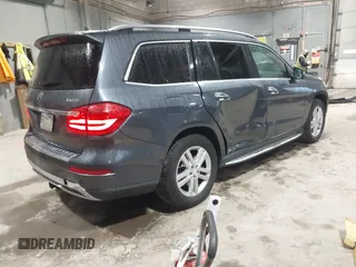 2013 Mercedes-Benz GL-Class GL 450 with VIN 4JGDF7CE1DA215608, listed as a IAAI auction lot 41924332 with 137,052 mi miles. Bid and sale history available at carsss.com. Image 4.