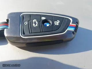 2016 BMW X5 M with VIN 5YMKT6C51G0R79331, listed as a IAAI auction lot 40590865 with 80,772 mi miles. Bid and sale history available at carsss.com. Image 11.