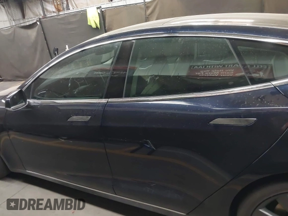 2014 Tesla Model S 60 with VIN 5YJSA1H11EFP56406, listed as a IAAI auction lot 42065157 with Not Provided miles and . Bid and sale history available at DreamBid. Image 14.