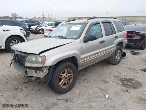2004 Jeep Grand Cherokee Laredo with VIN 1J4GX48S44C301120, listed as a IAAI auction lot 41281556 with 267,246 mi miles. Bid and sale history available at carsss.com. Image 18.