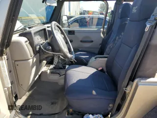 2006 Jeep Wrangler Rubicon with VIN 1J4FA69S36P744801, listed as a Copart auction lot 46541575 with 164,347 mi miles and Salvage title. Bid and sale history available at DreamBid. Image 7.