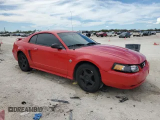 2004 Ford Mustang Standard with VIN 1FAFP40644F198897, listed as a Copart auction lot 47007415 with 129,067 mi miles and Salvage title. Bid and sale history available at DreamBid. Image 4.