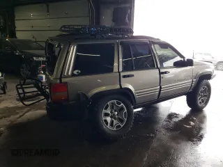 1998 Jeep Grand Cherokee Limited with VIN 1J4GZ78S9WC308708, listed as a Copart auction lot 79315694 with 205,976 mi miles and Salvage Title. Bid and sale history available at carsss.com. Image 3.