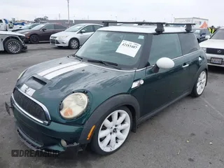 2009 MINI Hardtop S with VIN WMWMF735X9TT94065, listed as a IAAI auction lot 42183487 with 141,746 mi miles and . Bid and sale history available at DreamBid. Image 2.