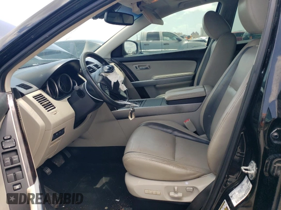 2012 Mazda CX-9 Grand Touring with VIN JM3TB2DA4C0361023, listed as a Copart auction lot 63839005 with 140,784 mi miles and Salvage title. Bid and sale history available at DreamBid. Image 7.