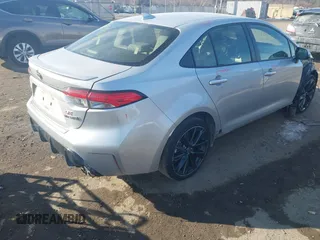 2023 Toyota Corolla Hybrid LE with VIN JTDBCMFEXP3014216, listed as a IAAI auction lot 41395095 with 63,820 mi miles. Bid and sale history available at carsss.com. Image 4.