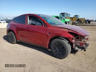 2024 Tesla Model Y Long Range with VIN 7SAYGDEE4RA257722, listed as a Copart auction lot 54577865 with 10,713 mi miles and Salvage Title. Bid and sale history available at DreamBid. Image 4.