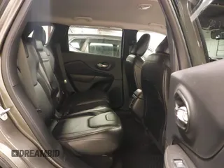2015 Jeep Cherokee Trailhawk with VIN 1C4PJMBSXFW563144, listed as a IAAI auction lot 40667962 with 121,536 mi miles. Bid and sale history available at carsss.com. Image 8.