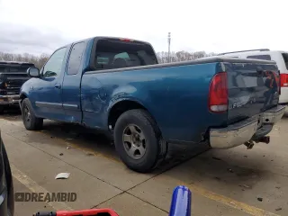 2000 Ford F-150 XL with VIN 1FTRX17W5YNA58235, listed as a Copart auction lot 84026504 with 0 mi miles and Salvage Title. Bid and sale history available at carsss.com. Image 2.