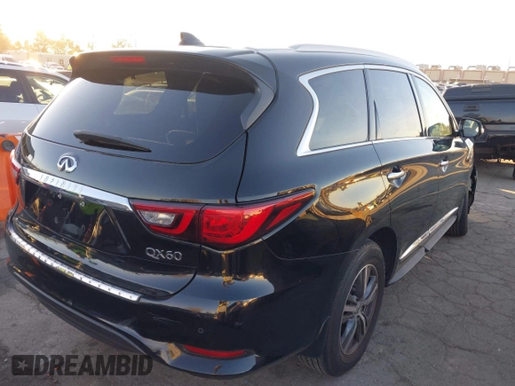 2020 Infiniti QX60 Pure with VIN 5N1DL0MNXLC505914, listed as a IAAI auction lot 41336979 with 53,813 mi miles and . Bid and sale history available at DreamBid. Image 4.