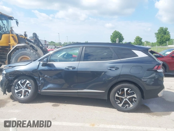 2023 Kia Sportage EX with VIN KNDPVCAG2P7046184, listed as a IAAI auction lot 42212231 with 25,212 mi miles and . Bid and sale history available at DreamBid. Image 14.