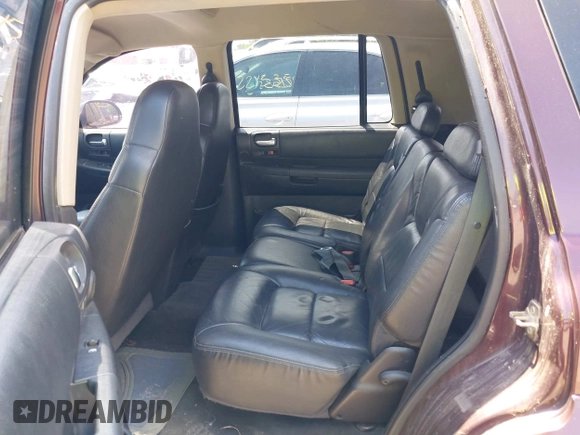 2003 Dodge Durango SLT Plus z VIN 1D4HS58N03F586049, wystawiony jako IAAI lot #42154236 z przebiegiem 253 727 mil mil oraz . Historia ofert i sprzedaży dostępna na DreamBid. Obrazek 8.